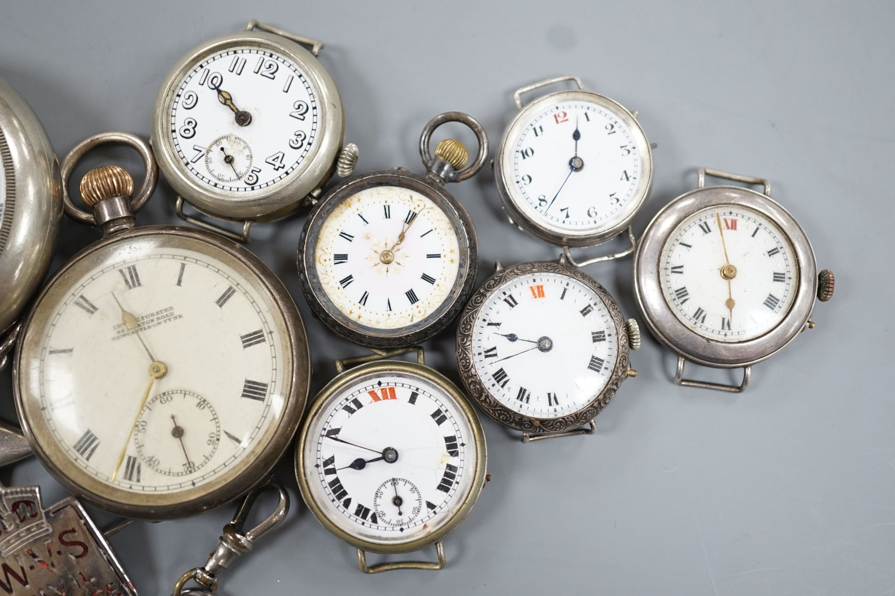 Four assorted early 20th century silver wrist watches, a silver fob watch, two base metal wrist watches, brooch, pendant and two pocket watches including one silver open face.